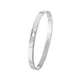 Messika Move Noa Bangle-Move Noa bangle in 18 karat white gold with three moving diamonds.