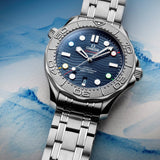 Omega Seamaster Diver 300 42mm - Beijing 2022-Omega Seamaster Diver 300 Co-Axial Master Chronometer "Beijing Olympics 2022" Special Edition in a 42mm stainless steel/titanium case with blue dial on stainless steel bracelet, featuring a date display and automatic movement.